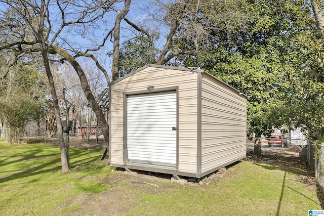 view of outdoor structure featuring a yard