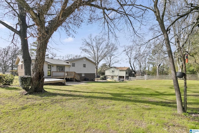 view of yard with a deck