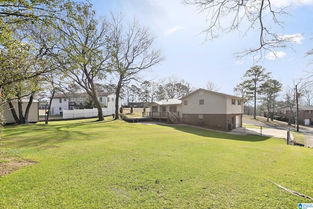 view of yard with a deck