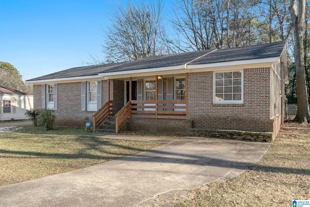 single story home featuring a front yard and a porch