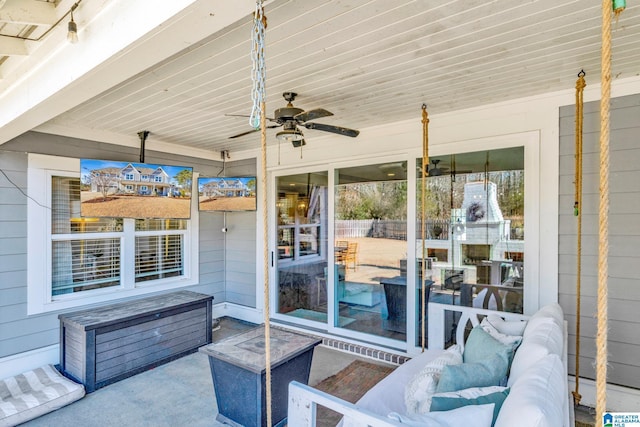 view of patio with ceiling fan and outdoor lounge area