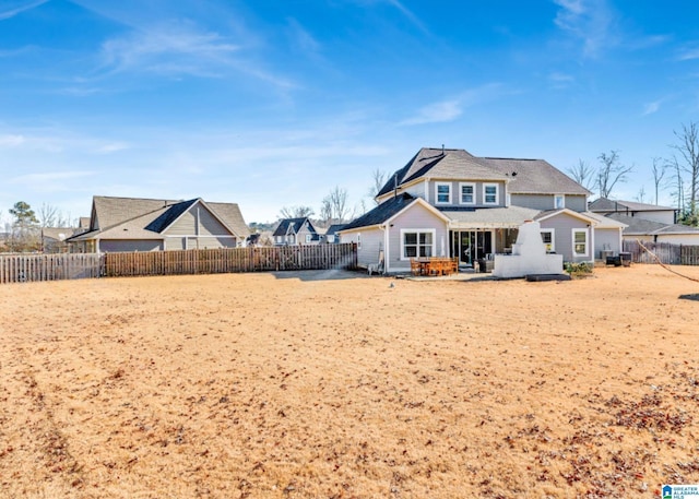 back of property featuring a patio