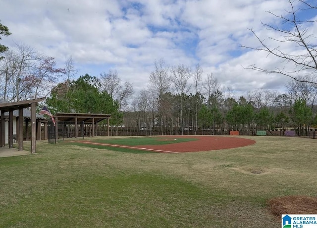 view of property's community with a lawn