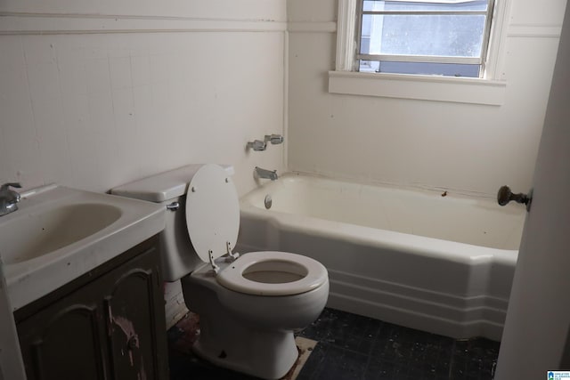 bathroom featuring toilet and vanity