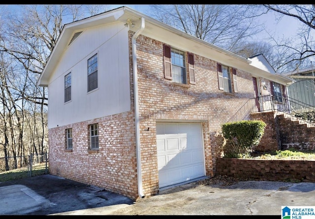 view of home's exterior with a garage