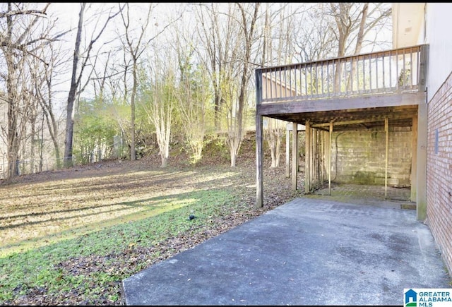 view of yard featuring a deck