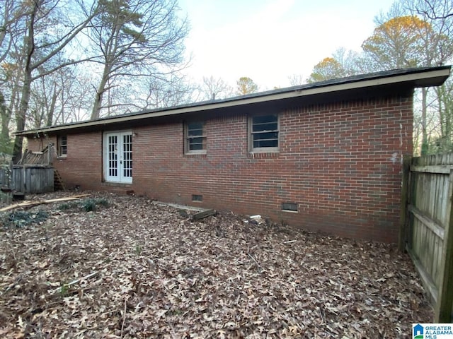 view of home's exterior with french doors