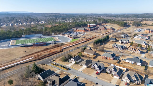 birds eye view of property with a residential view