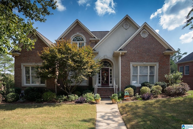 front facade with a front lawn