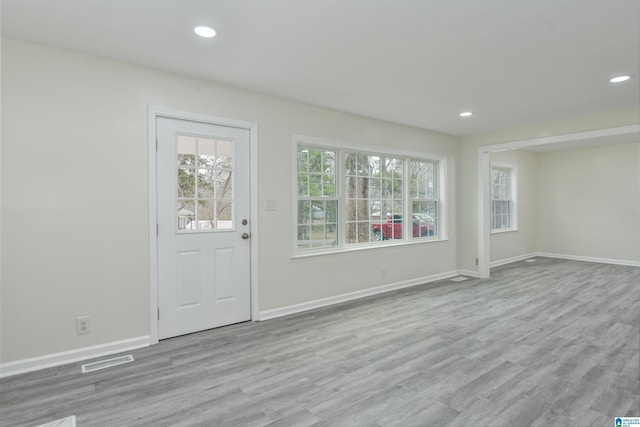 interior space with light hardwood / wood-style flooring