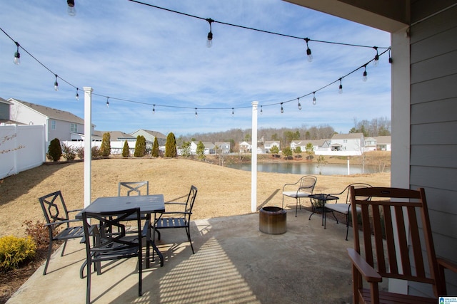 view of patio / terrace with a water view