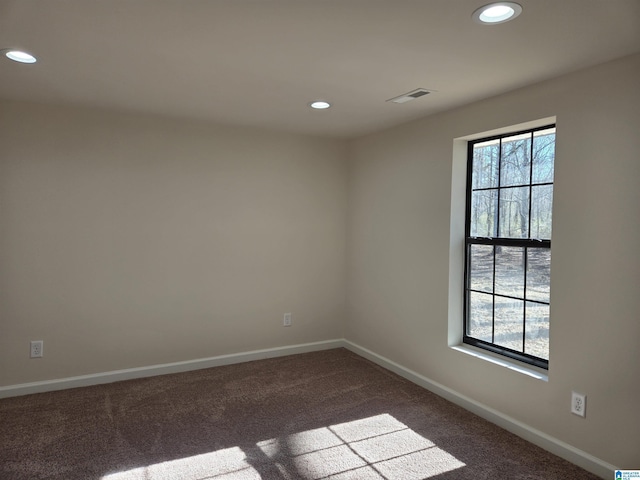 empty room featuring carpet