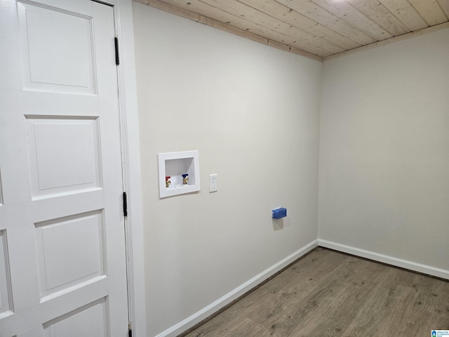 clothes washing area featuring washer hookup, hardwood / wood-style flooring, and wooden ceiling