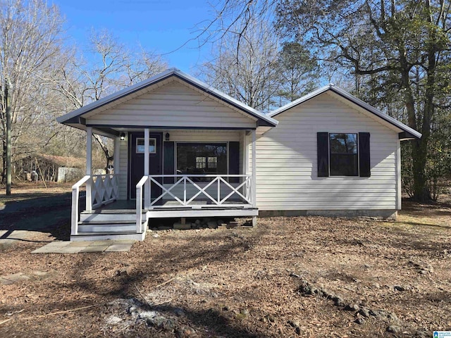 view of front of property featuring covered porch