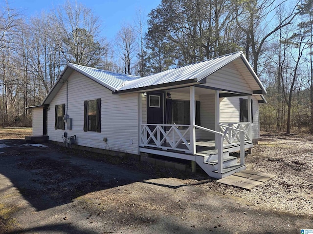 view of home's exterior with covered porch