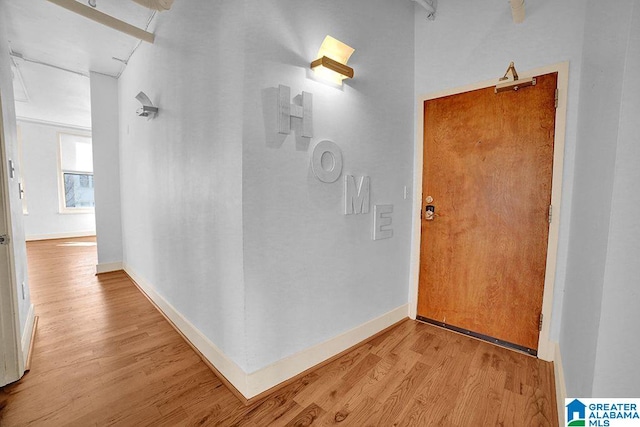 hallway featuring light hardwood / wood-style flooring