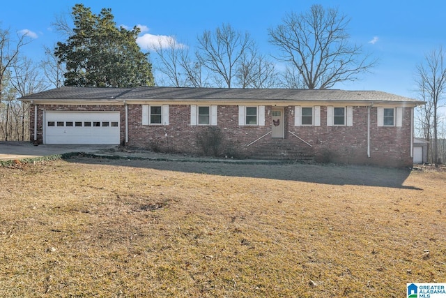 single story home with a front yard and a garage