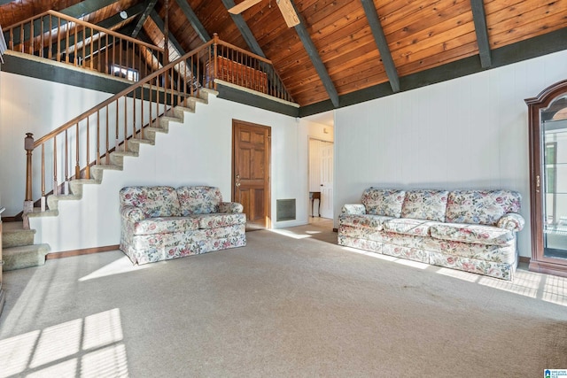 unfurnished living room featuring high vaulted ceiling, beam ceiling, wood ceiling, and carpet floors