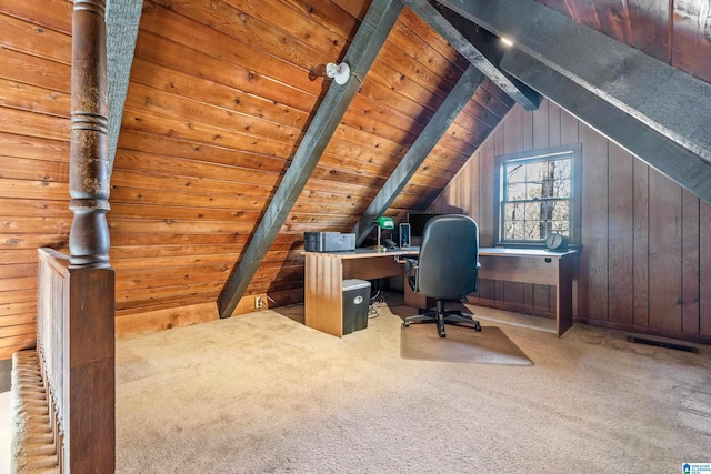 unfurnished office featuring light colored carpet, lofted ceiling with beams, wood ceiling, and wood walls