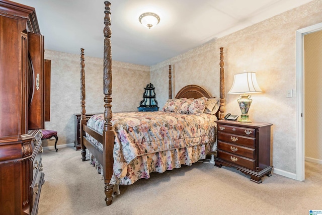 bedroom featuring light carpet