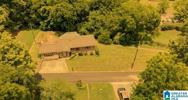 birds eye view of property with a rural view