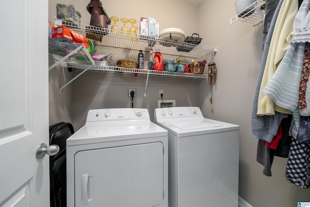 laundry area with washer and clothes dryer