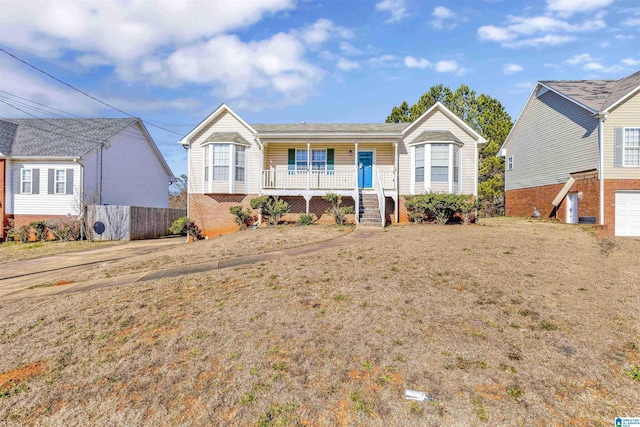 view of front of house with a front lawn and a porch