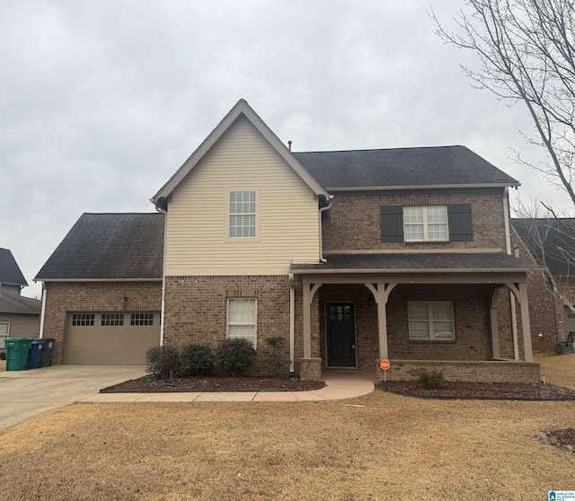 view of front facade with a garage and a front yard