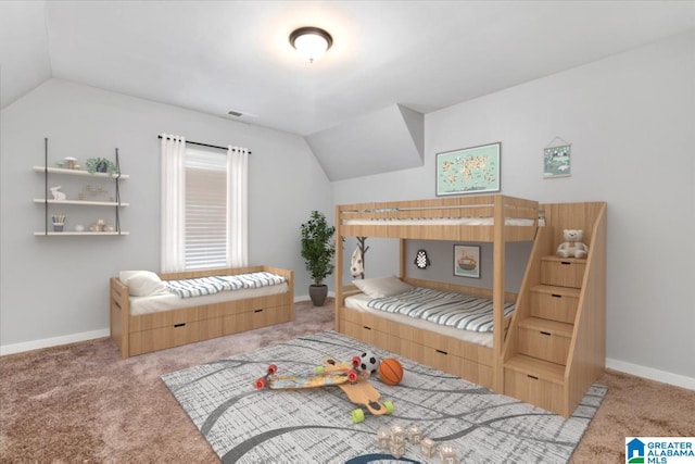 interior space featuring lofted ceiling and carpet