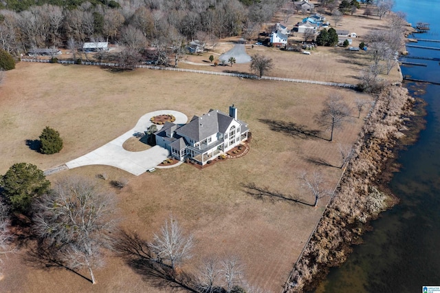 drone / aerial view with a water view