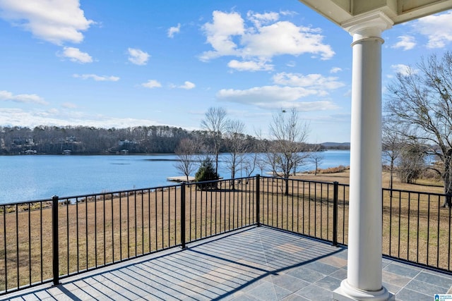 deck featuring a water view