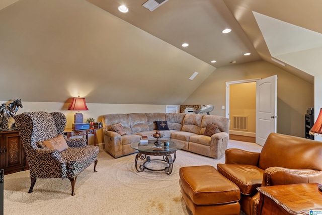 living room with vaulted ceiling and light carpet