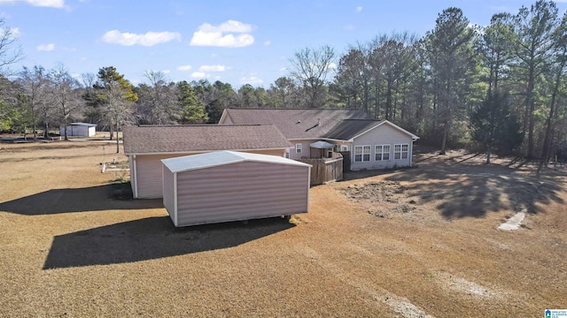 exterior space with a shed