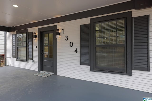 entrance to property with a porch