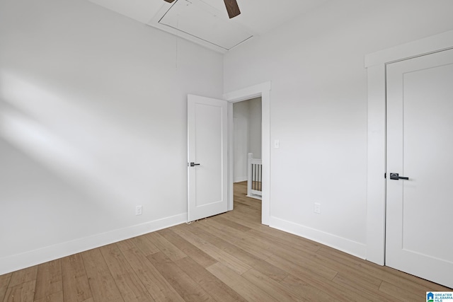 unfurnished bedroom with light hardwood / wood-style flooring and ceiling fan