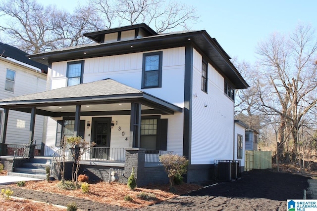 prairie-style house featuring a porch and cooling unit