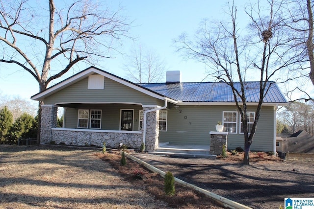 view of front of home featuring covered porch