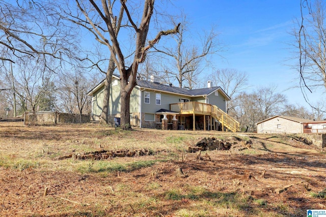 rear view of house with a deck