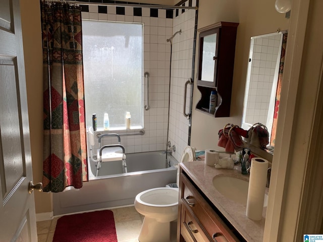 full bathroom with toilet, tiled shower / bath combo, tile patterned floors, and vanity