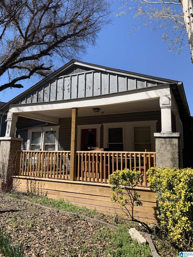 view of front facade featuring a porch and board and batten siding