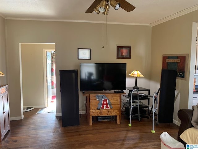 living room featuring ceiling fan, crown molding, and dark hardwood / wood-style floors