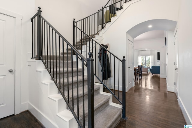 stairway with wood-type flooring