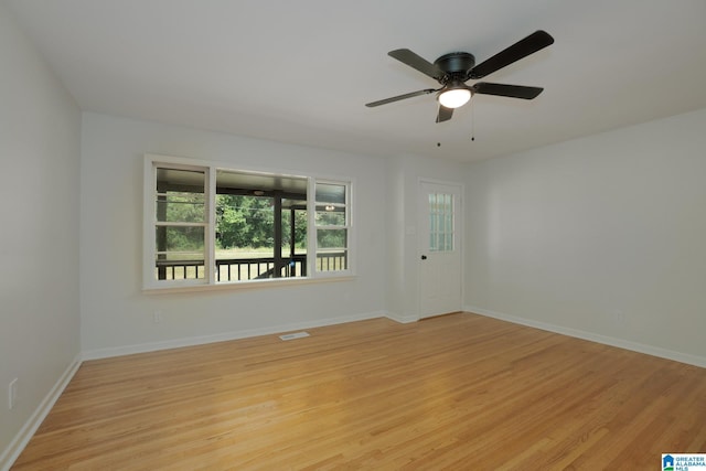 unfurnished room featuring ceiling fan and light hardwood / wood-style floors