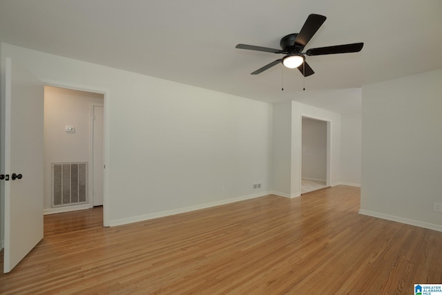 unfurnished room featuring ceiling fan and light hardwood / wood-style flooring