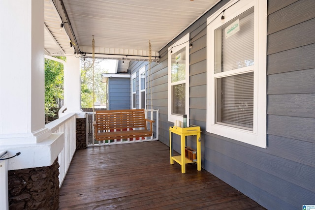 deck featuring covered porch