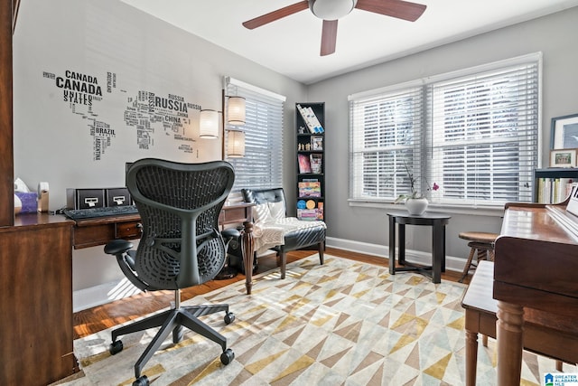 office area with ceiling fan