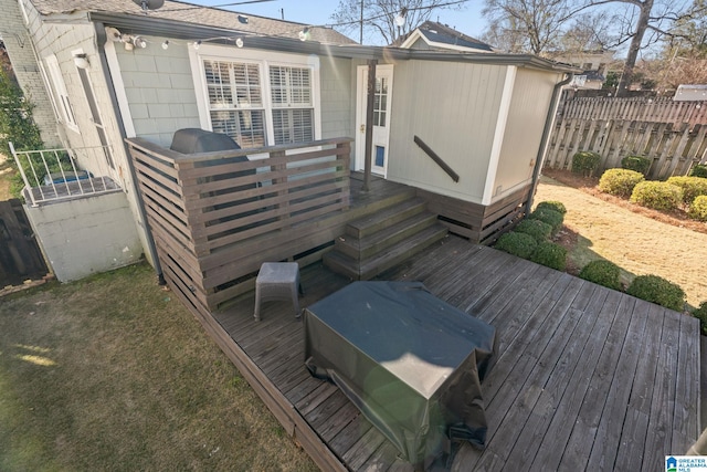 wooden terrace featuring area for grilling