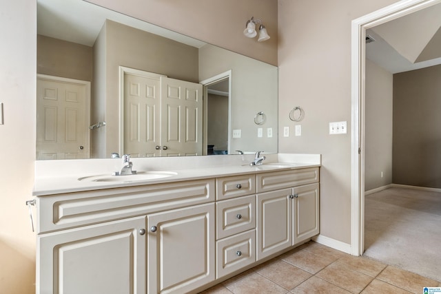 bathroom with vanity and tile patterned flooring