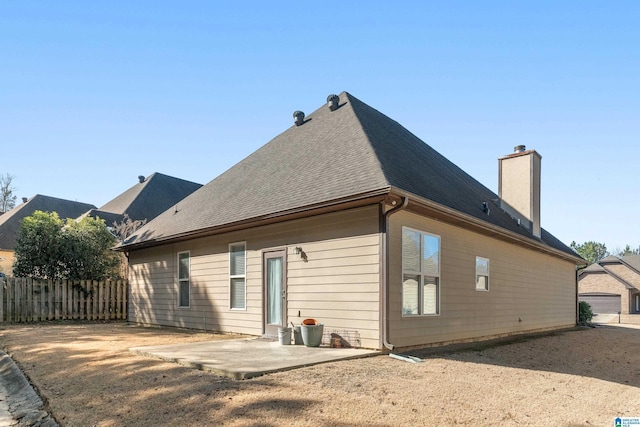 rear view of property with a patio