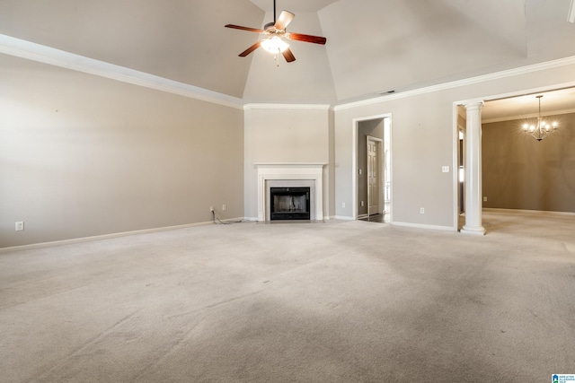 unfurnished living room with light carpet, ornamental molding, high vaulted ceiling, and ornate columns